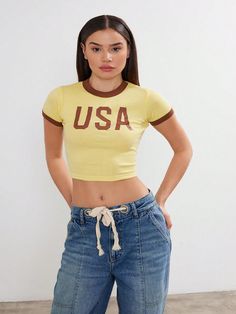 Women's "USA" printed two tone cotton crop top. One of the bestsellers in retail that is good for juniors and adults. High quality materials and high quality print with the new 2024 spring and summer colors. A great piece to have that will match with many bottoms and can be made a summer outfit easily.USA Printed Crop Top Women's And Juniors Cotton USA Crop Top Cropped T-Shirt Yellow Casual  Short Sleeve  Letter    Women Clothing, size features are:Bust: ,Length: ,Sleeve Length: Cheap Cropped T-shirt For Sports, Cheap Yellow Crop Top With Short Sleeves, Cheap Sports Cropped T-shirt, Cheap Sports Cropped T-shirt With Short Sleeves, Trendy Yellow Forever 21 Crop Top, Cotton Crop Top, Usa Print, Print Crop Tops, Crop Tshirt