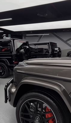 the interior of a car showroom with several vehicles