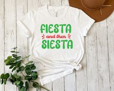 Fiesta And Then Siesta Shirt, Cinco De Mayo shirt, Mexican Party Shirt, Funny Shirt, Funny Gift, Mexican Festival Shirt, Fiesta Party * Processing time is 1 business day (there may be exceptions during holiday seasons). Delivery time is based on your shipping type selection and location. Please check the estimated delivery times at checkout and upgrade the shipping at checkout if you need it sooner. * All items are made-to-order. Because of the nature of these items, unless they arrive damaged o White Crew Neck Shirt For Cinco De Mayo, Casual Crew Neck Top For Fiesta, Casual Festive Tops For Festivals, Mexican Festival, Fiesta Shirt, Festival Shirt, Mexican Party, Festival Shirts, Fiesta Party