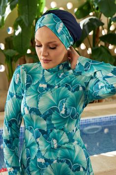 This special elastic burkini suit in blue tones with a Hawaiian theme offers you comfort and elegance together. With the assurance of Burkini Remsa, you can safely place your order and receive it easily. In addition, this specially designed product is produced from high-quality fabric and has water repellent properties. Hawaiian Theme, Place Your Order, Blue Suit, Blue Tones, Repellent, Water Repellent, Quality Fabric, Hawaii, Elastic