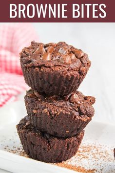 three chocolate brownie bites stacked on top of each other