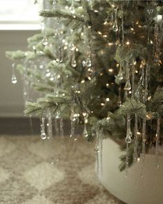 a christmas tree with icicles hanging from it