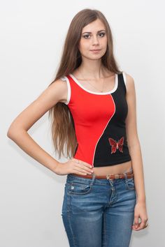 Cotton embroidered sport top One size XS only Total sale Basic Cotton Sports Crop Top, Basic Cotton Crop Top For Sports, Summer Sports Cotton Crop Top, Red Tank Top For Streetwear, Sporty Cotton Crop Top Tank, Spring Sports Cotton Tops, Red Stretch Y2k Tank Top, Cotton Sports Tops For Summer, Fitted Tops With Butterfly Embroidery For Spring