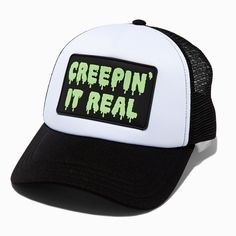 Claire's "Creepin' It Real" Glow in the Dark Trucker Hat Black Halloween Trucker Hat, Novelty Trucker Hat With Curved Bill, Halloween Snapback Baseball Cap For Streetwear, Novelty Snapback Hat With Letter Print For Streetwear, Novelty Letter Print Snapback Hat For Streetwear, Halloween Snapback Trucker Hat For Streetwear, Halloween Streetwear Baseball Cap, Adjustable Halloween Hats For Streetwear, Black Snapback Trucker Hat For Halloween