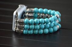 "This lovely beaded iwatch band is made from Turquoise stone and silver plated findings. Beads are 8mm round and total weight is 56 gram for 5\" long band. You can personalize your band by adding up to 8 letters to it. Letter beads are silver plated and double-sided. The watch band fits all iwatch as long as you select the right iwatch size (38mm, 40mm, 42mm or 44mm). There are no clasps, the cord can stretch. Measure your wrist tightly and select your SIZE from the drop-down menu. This is the m Bohemian Silver Watch Bands With Bracelet Strap, Bohemian Silver Bracelet Strap Watch Bands, Bohemian Silver Watch Band As Gift, Bohemian Silver Watch Bands As Gift, Silver Adjustable Bohemian Apple Watch Band, Bohemian Adjustable Silver Apple Watch Band, Bohemian Silver Adjustable Apple Watch Band, Silver Adjustable Apple Watch Band With Round Beads, Adjustable Silver Beaded Apple Watch Band