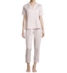 Combining contemporary styling with a classic silhouette, this pajama set has muted sateen and batiste stripes for a lovely, luxurious look. Made of woven 100% Pima cotton with satin piping. Includes pajama top and elastic waist pants with tone-on-tone satin piping accents. Pajama top has rounded, notched collar with piped edge. Full button front has four functional buttons. Left side chest pocket has matching piping. Short sleeves with wide cuffs. Straight hem has side vents for movement. Elast White Pajamas, Side Chest, Elastic Waistband Pants, White P, Clean Cotton, Elastic Waist Pants, Pajama Top, Long Sleeve Pyjamas, Notched Collar