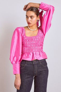 Our pink Ariana blouse boasts puff sleeves, a shirred bust and feminine bow details. •Shirred bodice •Long puff sleeves •Back bow detail •Select your normal size •100% Recycled Polyester •Designed in London MODEL INFO: Model is 1 is 5'10.5 and is wearing a UK 10. Model is 2 is 5'9 and is wearing a UK 16. Pink Fitted Blouse With Balloon Sleeves, Pink Fitted Puff Sleeve Top, Pink Fitted Puff Sleeve Top With Balloon Sleeves, Pink Ruffled Puff Sleeve Blouse, Spring Pink Puff Sleeve Top With Gathered Sleeves, Pink Puff Sleeve Blouse With Ruffles, Pink Tops With Puff Gathered Sleeves, Pink Puff Sleeve Top With Gathered Sleeves, Feminine Pink Puff Sleeve Top