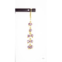 These pretty Purple Glass Fringe Twist Earrings are so fun, and unique! The pretty purple faceted glass beads are complemented by gold-plated Figaro chain. Gold-plated sterling silver lever backs. They are 2 inches long! These dangle earrings are lightweight and lovely! They have a charming little twist in how they dangle!Perfect for adding a touch of girly color and sparkle to any outfit. They are sure to become one of your favorites! Gold Linear Earrings With Dangling Beads For Party, Elegant Purple Beaded Earrings With Faceted Beads, Purple Dangling Beads Earrings For Party, Purple Dangling Beads Party Earrings, Purple Dangling Beads Chandelier Earrings, Elegant Festive Earrings With Beaded Chain, Elegant Gold Chandelier Earrings With Beaded Chain, Purple Dangling Beads Jewelry For Party, Elegant Gold Beaded Chain Chandelier Earrings