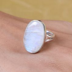 Rainbow Moonstone Ring, 925 Sterling Silver Ring, Oval Shaped Ring, Gemstone Ring, Handmade Ring, Ring for Women, Crystal Ring, Boho Ring Gemstone Name - Rainbow Moonstone  Stone Quality - AAA Ring Weight - 6.84 gm Length - 2.5 cm Width - 1.5 cm Stone Shape - As shown in the picture You'll get the exact product as shown in the pictures We serve complete 925 sterling silver Jewelry and genuine properties of the stone. The products are dispatched from the small business from USA. Product Quality a White Oval Moonstone Ring With Large Stone, White Oval Ring With Natural Stones, White Oval Rings With Natural Stones, Oval White Rings With Natural Stones, White Oval Crystal Ring With Natural Stones, Oval Crystal Ring With Natural Stones For Anniversary, Oval Moonstone Crystal Ring With Natural Stones, Oval Moonstone Ring With Natural Stones, Large Oval White Moonstone Ring