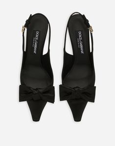 Satin slingbacks with bow detail: Black 105-mm heel Kidskin insole with branded label Branded leather sole Item comes with a branded dust bag Made in Italy Slingbacks, Bow Detail, Women's Pumps, Bag Making, Dolce And Gabbana, Dust Bag, Top Brands, In Italy, Pumps