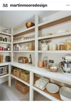 a kitchen with shelves filled with dishes and bowls