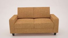 a brown couch sitting on top of a white floor