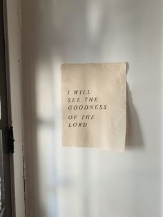 a piece of paper hanging on the wall