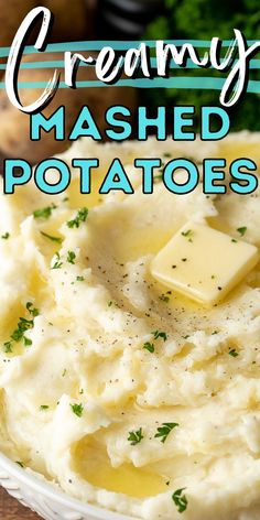 mashed potatoes in a white bowl with parsley on top and text overlay reading creamy mashed potatoes