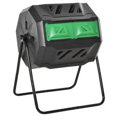 a black and green light is on top of a stand