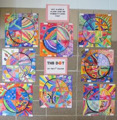 a bulletin board with many different colored circles and words on it that say the dot