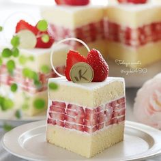 there is a piece of cake with strawberries on top