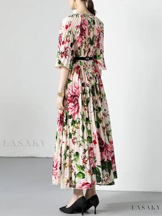 Kaia Belt Maxi Gown Spring Floral Print V-neck Gown, Spring Garden Party A-line Gown, Long Sleeve Gown For Spring Garden Party, Spring Garden Party Gown With Long Sleeves, Summer Floral Print Long Sleeve Gown, Pink Short Sleeve Gown For Spring, Spring Floral Print A-line Gown, Chic Floral Print Summer Gown, Chic Summer Floral Print Gown