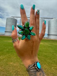 New without tags* BRAND : TTD * ETHNIC REGIONAL STYLE : Southwest Non Native * JEWELRY TYPE : Ring  * MATERIAL: Stone * METAL: Sterling Silver * COUNTRY/REGION OF MANUFACTURE :United States * MAIN STONE/S : Sonoran Mountain Turquoise Beautiful ring. Southwest Handmade Sonoran Mountain Turquoise  Sterling Silver Adjustable Cluster Ring. It measures 1 3/4 inches long and 1 1/2 inches wide. Signed by the artist and stamped sterling silver.   Thank you for checking out my store, if you have any ques Southwestern Multi-stone Green Jewelry, Southwestern Green Multi-stone Jewelry, Southwestern Style Green Multi-stone Jewelry, Collectible Green Multi-stone Jewelry, Collectible Green Turquoise Ring, Native Jewelry, Tucson Az, Beautiful Ring, Cluster Ring