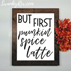 a sign that says but first pumpkin spice latte next to an orange flower on a white wall