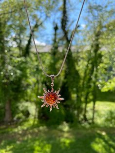 Sun Pendant. Baltic Amber Sun Pendant Sterling Silver Cognac | Etsy Sun Jewelry, Sun Necklace, Sun Pendant, Cognac Color, Dream Gift, Amber Necklace, Amber Jewelry, Dream Jewelry, Baltic Amber