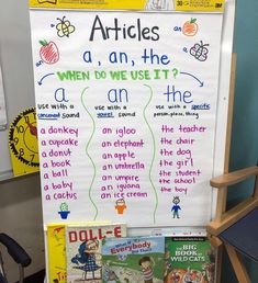 a white board with writing on it and some children's books next to it