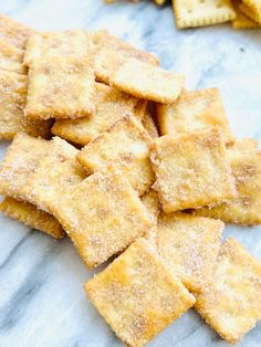 some crackers are sitting on a marble surface