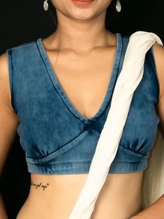 Gorgeous, high-end, tailored high quality stretch denim saree blouse LEHENGA blouse. Fits beautifully and pairs well with most sarees or lehenga skirts. A good addition to the traditional dhoti pants. A unique modern flavor to timeless traditional clothing. Sizes available are 32 (XS), 34 (S), 36 (M), 38 (L) Denim Saree Blouse, Denim Blouse With Saree, Fitted Denim Blue V-neck Top, Fitted Indigo Blouse For Summer, Fitted Indigo Summer Blouse, Fitted Cotton Blouse For Navratri, Fitted Cotton Choli With Pallu, Fitted Bollywood Cotton Saree, Fitted V-neck Top For Navratri