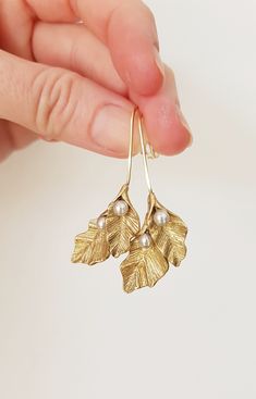 Raw Brass Hoop Earrings with organic shaped shaped leaf pendants with a modern rustic look. Perfect choice for your special outfits, eye catching  and comfortable to wear. Very beautiful natural raw brass color with an antique finish, the leaves have an organic shape and are adorned with small 4 mm Swarovski pearls. They hang gently on short brass ear hooks that I carefully hammered for a natural look.  Raw brass gets more beautiful while it ages, creating an unique patina after each wear. If yo Handmade Leaf-shaped Jewelry For Wedding, Handmade Leaf-shaped Wedding Jewelry, Handmade Leaf-shaped Earrings For Weddings, Handmade Leaf-shaped Wedding Earrings, Art Nouveau Wedding, Nouveau Wedding, Special Outfits, Art Nouveau Weddings, Bijoux Art Nouveau