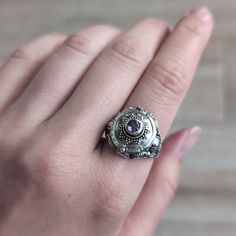 Marked 925 For Sterling Silver. Amethyst Center Stone Vintage "Poison"Ring The Top Opens Up And Has A Small Closure. Also Known As A "Mourning" Ring Where People Used To Store Hair Of Their Deceased Loved Ones. So Much Detail In This Ring! Beautifully Handmade Timeless And Classic Versatile And Practical Such A Statement-Making Ring Comfortable And Easy To Wear Perfect For Everyday Approx. Size 9 Normal Hairline Scratches And Patina That Is Typical Of Sterling Silver Jewelry. Overall In Great Vintage And Pre-Owned Condition With Nothing Major To Note. Poison Ring, Womens Jewelry Rings, Vintage Sterling Silver, Sterling Silver Jewelry, Patina, Silver Jewelry, Amethyst, Women Jewelry, Collage