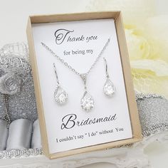 "⚠️⚠️⚠️ PLEASE MAKE SURE TO SEE THE PHOTO TO CHOOSE WHICH MESSAGE CARD NUMBER (#1-30) YOU WOULD LIKE ⚠️⚠️⚠️ SPECIFICATIONS: ♠ For Earrings * Length : 1 \" (Total Length) * Crystal Size : 8 mm * Metal Type : Copper + Rhodium Plated * Material : Crystal ♠ For Necklace * Pendant Length : 7/8 \" (2.2 cm)-Total Length * Crystal Size : 8 mm * Necklace Chain Length : 16' IN + Extension 3\" * Metal Type : Copper + Rhodium Plated * Material : Crystal * The parts that we use to make this jewelry are made Crystal Jewelry Sets For Gifts, Silver Pear-shaped Jewelry Sets Gift, Silver Teardrop Jewelry Sets For Gifts, Silver Teardrop Jewelry Sets As Gift, Silver Teardrop Jewelry Sets, White Teardrop Jewelry Sets For Gifts, Teardrop Jewelry Sets With Matching Earrings For Gifts, Teardrop Jewelry Sets With Matching Earrings As Gift, Bridesmaids Shirts