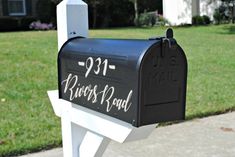 a mailbox with the name ross road written on it