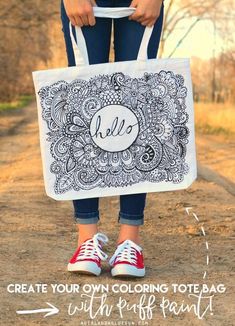 a person holding a bag with the words hello on it and an image of a woman's feet