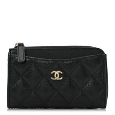 This is an authentic CHANEL Caviar Quilted CC Zip Around Card Holder in Black. This stylish card case is crafted of diamond-quilted caviar leather in black. The case features a front pocket with gold CC logo and card slots at the back. The top zipper opens to a burgundy fabric interior. Chanel Card Holder, Burgundy Fabric, Chanel Wallet, Chanel Caviar, Card Holder Wallet, Cc Logo, Card Case, Chanel Classic, Front Pocket