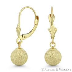 The featured earrings are cast in 14k yellow gold and showcase matte / satin-finished hollow ball beads finished with leverback posts for secure wear. Your purchase will include a 30-Day Exchange or Money-Back Guarantee & Free US Shipping. Please email us for more details regarding this listing. Size: 5 mm.  Color: Metal Type.  Gender: female.  Age Group: adult. Gold Matte Finish Jewelry Gift, Matte Finish Gold Jewelry Gift, Elegant Matte Finish Jewelry For Gifts, Classic Matte Finish Jewelry Gift, Masonic Ring, Gold Jewelry Earrings, Leverback Earrings, Charm Rings, Matte Satin