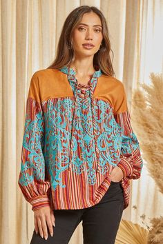 This beautiful striped pattern blouse features a suede panel with lace up detail. This top features gorgeous embroidery with long sleeves. One of a kind. Non sheer, woven. Brown Patchwork Long Sleeve Blouse, Long Sleeve Peasant Top With Boho Print For Fall, Long Sleeve Boho Print Peasant Top For Fall, Fall Boho Print Long Sleeve Blouse, Long Sleeve Boho Print Blouse For Fall, Multicolor Peasant Top For Fall, Brown Boho Print Blouse For Fall, Brown Boho Print Tops For Fall, Bohemian Long Sleeve Top For Fall