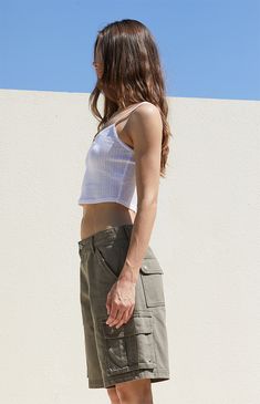 Introducing the Olive Baggy Cargo Jorts from PacSun, your essential blend of comfort and street style. With cargo side pockets and button-flap back pockets, these high-waisted jorts offer a longer inseam for a boyfriend-inspired look and a baggy, relaxed fit that's perfect for casual outings and adventures. Cargo Jorts Outfits, Style With Cargo, Green Cargo, Swim Shop, Dope Outfits, Baggy Fits, Exclusive Collection, Pacsun, Swim Shorts