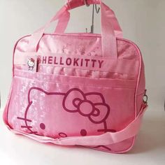 Introducing the Hello Kitty Travel Bag, a stylish and functional accessory perfect for fans of the beloved Sanrio character. Designed to add a touch of charm to your travels, this bag combines practicality with adorable aesthetics. 🎀✈️🌟 Hello Kitty Travel, Hello Kitty Print, Hello Kitty Cat, Hello Kitty Design, Bags Cute, Mummy Bag, Cute Hello Kitty, Luggage Bags Travel, Gift Inspo