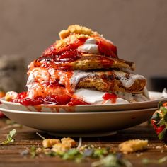 strawberry shortcakes stacked on top of each other in a bowl