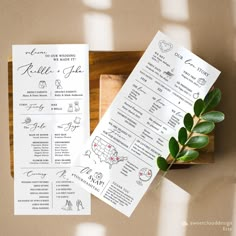 the wedding program is displayed on top of a wooden box next to some greenery