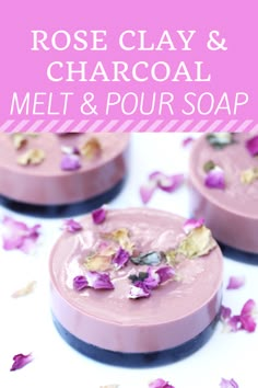 rose clay and charcoal melt & pour soap on a white surface with pink flowers in the background