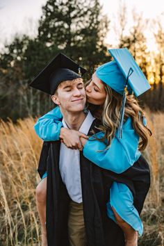 a woman hugging a man in a graduation cap and gown while he is holding her