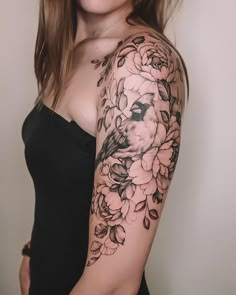 a woman with a tattoo on her arm