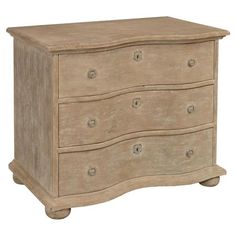 an old chest of drawers with four drawers