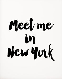 the words meet me in new york are painted on a white background with black ink