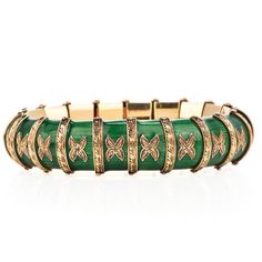 Be amazed by this vintage 1930's green Enamel 18K Yellow Gold flexible snake Bracelet. The green Paillonne enamel shine with every movement.Elegant Hand-carved engraving of the gold detailing enhances this bracelet’s eye-catching effect. For security, this 79.2-gram bracelet has two two safety clasp for securing.Measurements: 17 mm width X 7.0 InchesWeight: 98.2 GramsClasp: Insert ClaspCondition: ExcellentAccompanied by an official appraisal document. Green Enamel Bangle, Snake Green, Two Two, 18k Gold Bracelet, Diamond Weave, Yellow Gold Wedding Band, Gold Armband, Jewelry Appraisal, Snake Bracelet