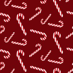 candy canes on a red background with white letters and numbers in the middle,