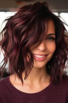 Choose deep burgundy shag with a wavy texture for a classy, rich look. The shag hairstyle is of medium length, deep burgundy in color and wavy for a natural look and professionalism. Click here to check out more trending medium-length shag haircut ideas. Ash Brown Short Hair Balayage, Highlights For Red Brown Hair, Highlight For Graying Hair, Cute Short Fall Hairstyles, Mid Length Angled Haircut, Medium Length Haircut Beach Waves, Short Medium Hairstyle Women Layers, Dark Fall Colors For Hair, Balayage Hair With Red Tones