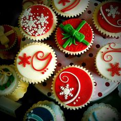 cupcakes decorated with red and white frosting