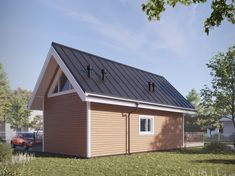 a small wooden house with a metal roof